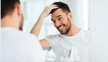 a dentist looking at an X-ray