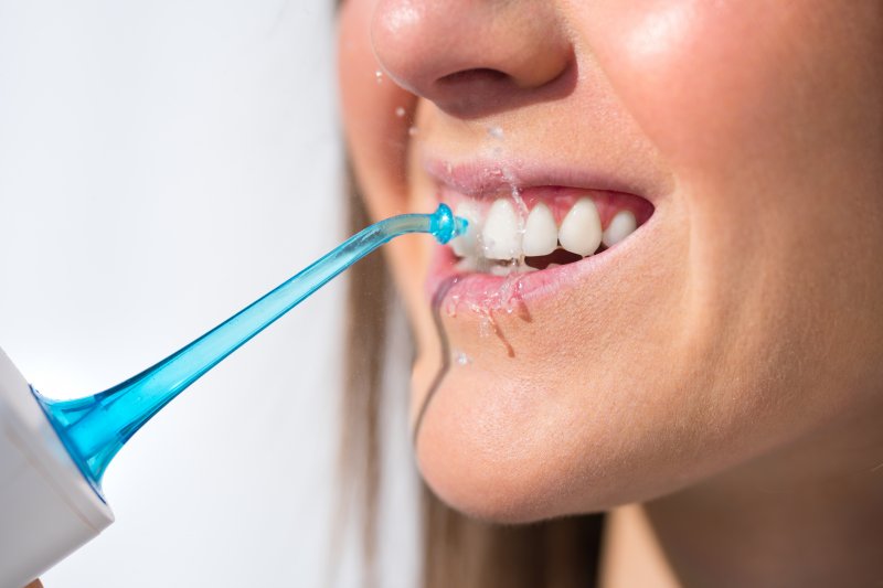 Does Your Dentist Recommend Water Pik Or Dental Floss Dr Hal Lippard